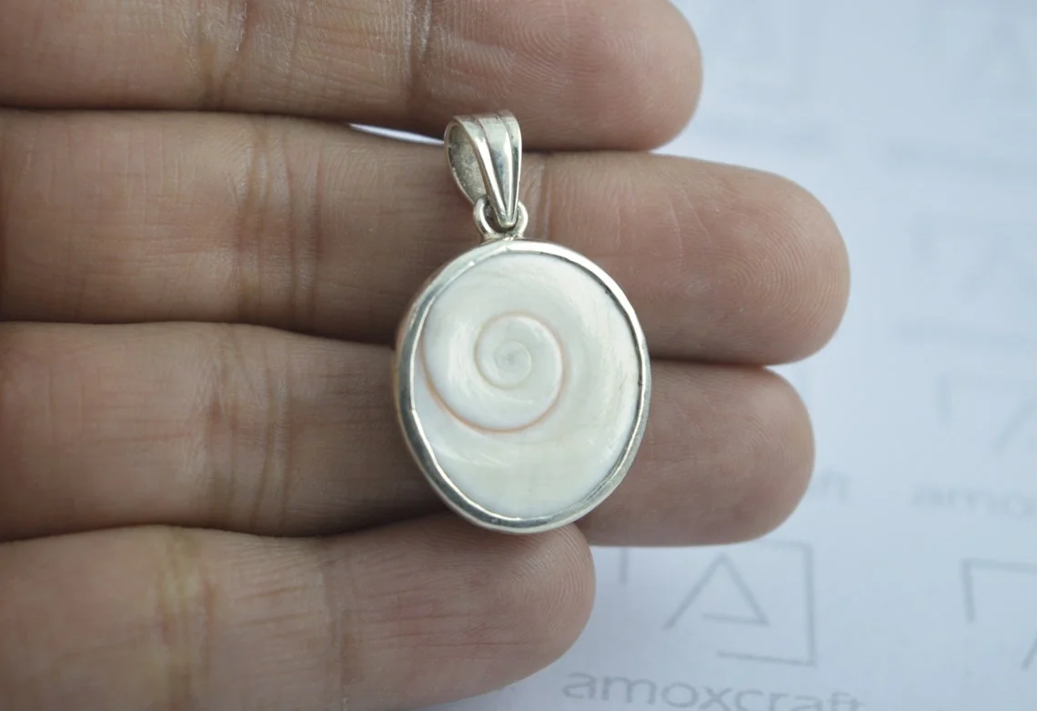 Natural Gomti (Gomati) Chakra pendant in silver